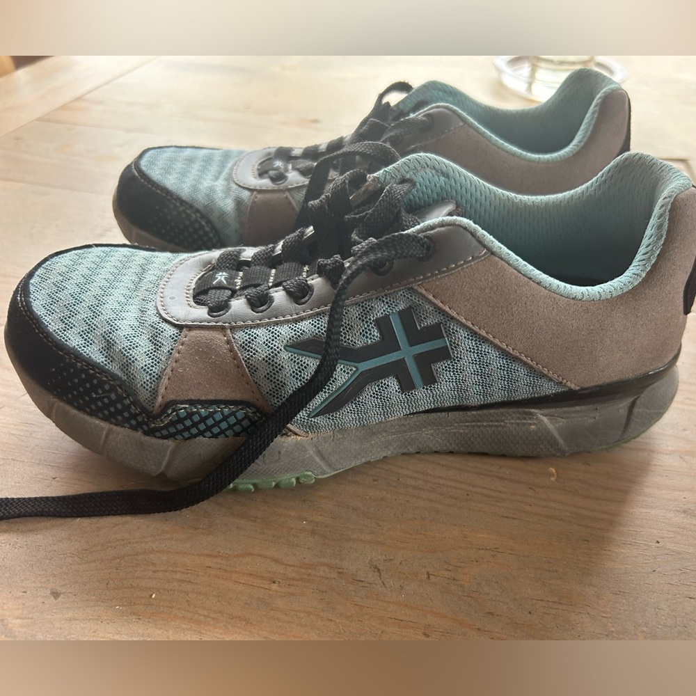 KURU tennis shoes.